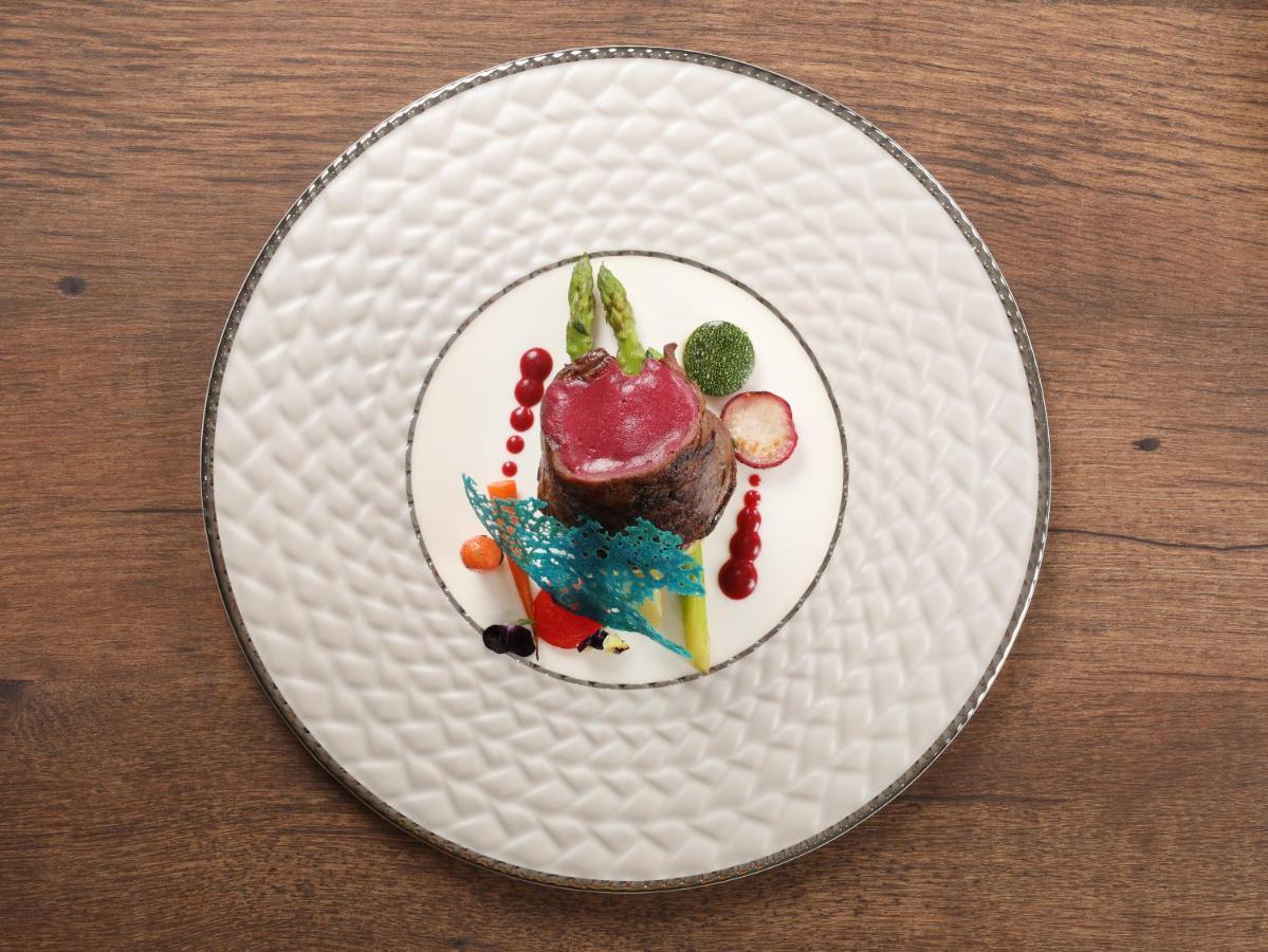 Peridot Grand Luxury Boutique Hotel Hanoi Kültér fotó A plate of food